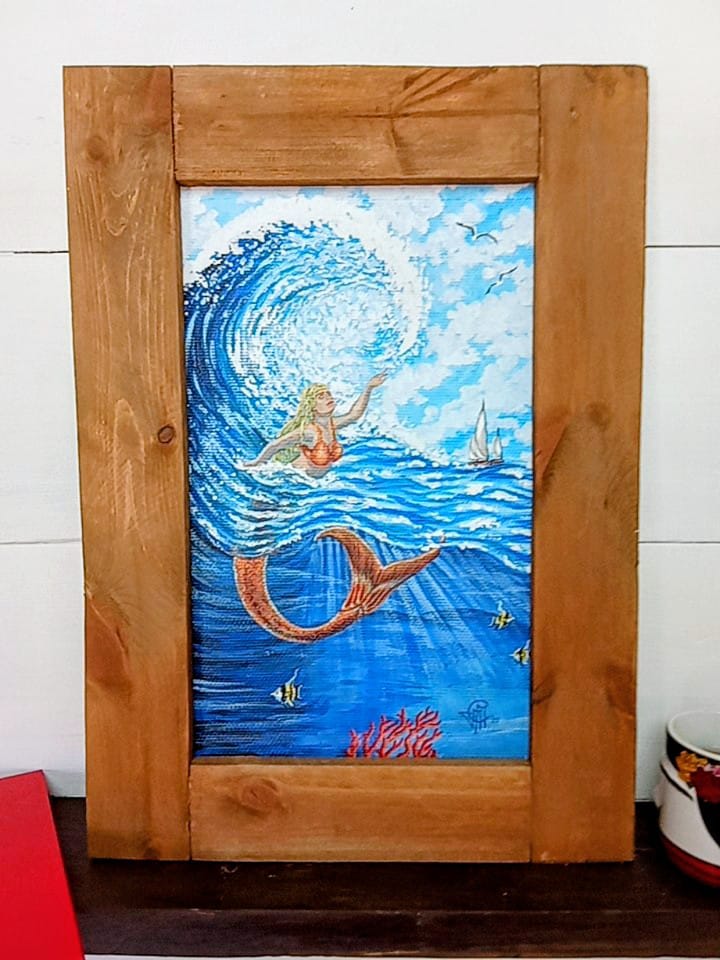 Sirena en la ola